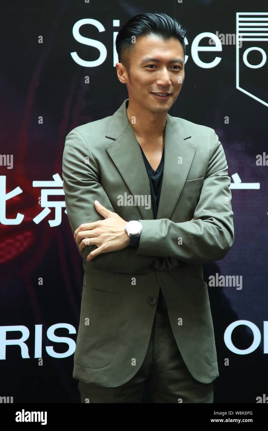 Hong Kong singer and actor Nicholas Tse poses during the opening
