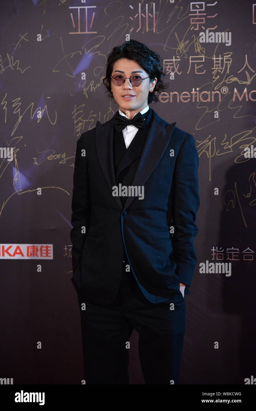 Japanese singer Jin Akanishi arrives on the red carpet for the