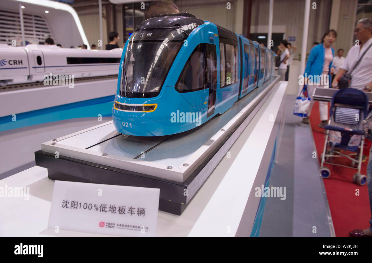 FILE--Model trains at the stand of CRRC Corporation are on display