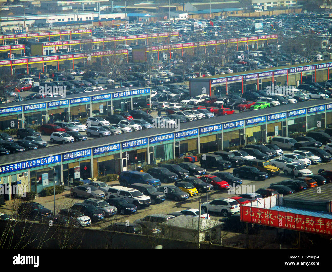 --FILE--Second-hand cars are for sale at a used car market in Beijing, China, 6 March 2016.  China aims to tap the potential in the used car trading m Stock Photo