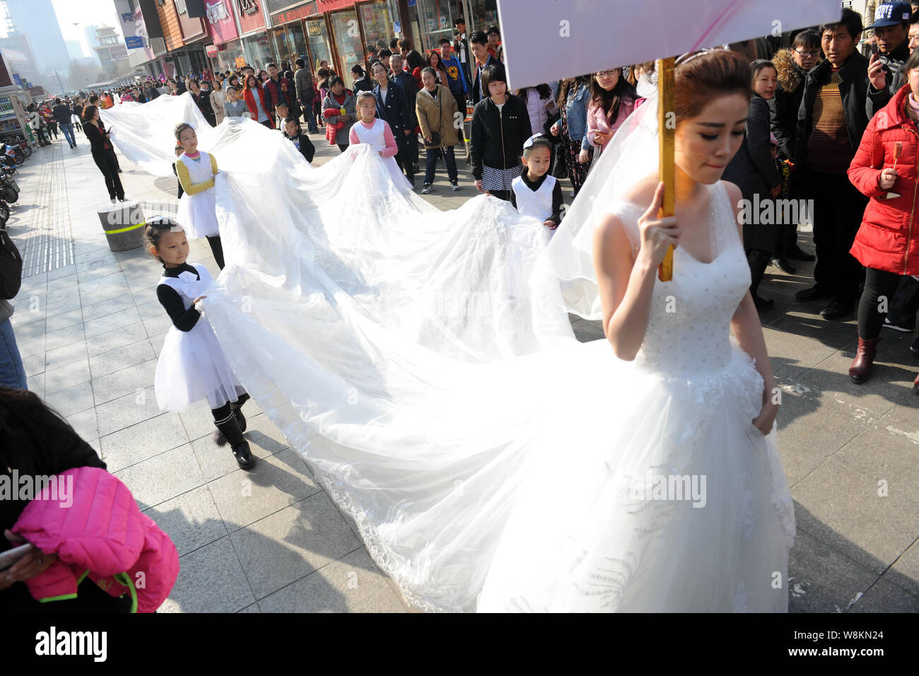 long tail wedding gown