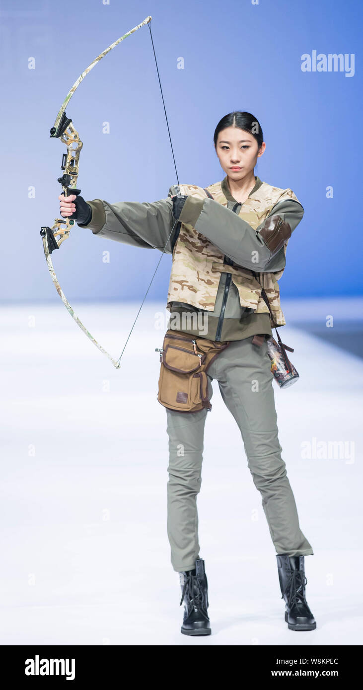 A model displays a new creation during a fashion show of sportswear  released by senior students from Beijing Institute of Fashion Technology  before gr Stock Photo - Alamy