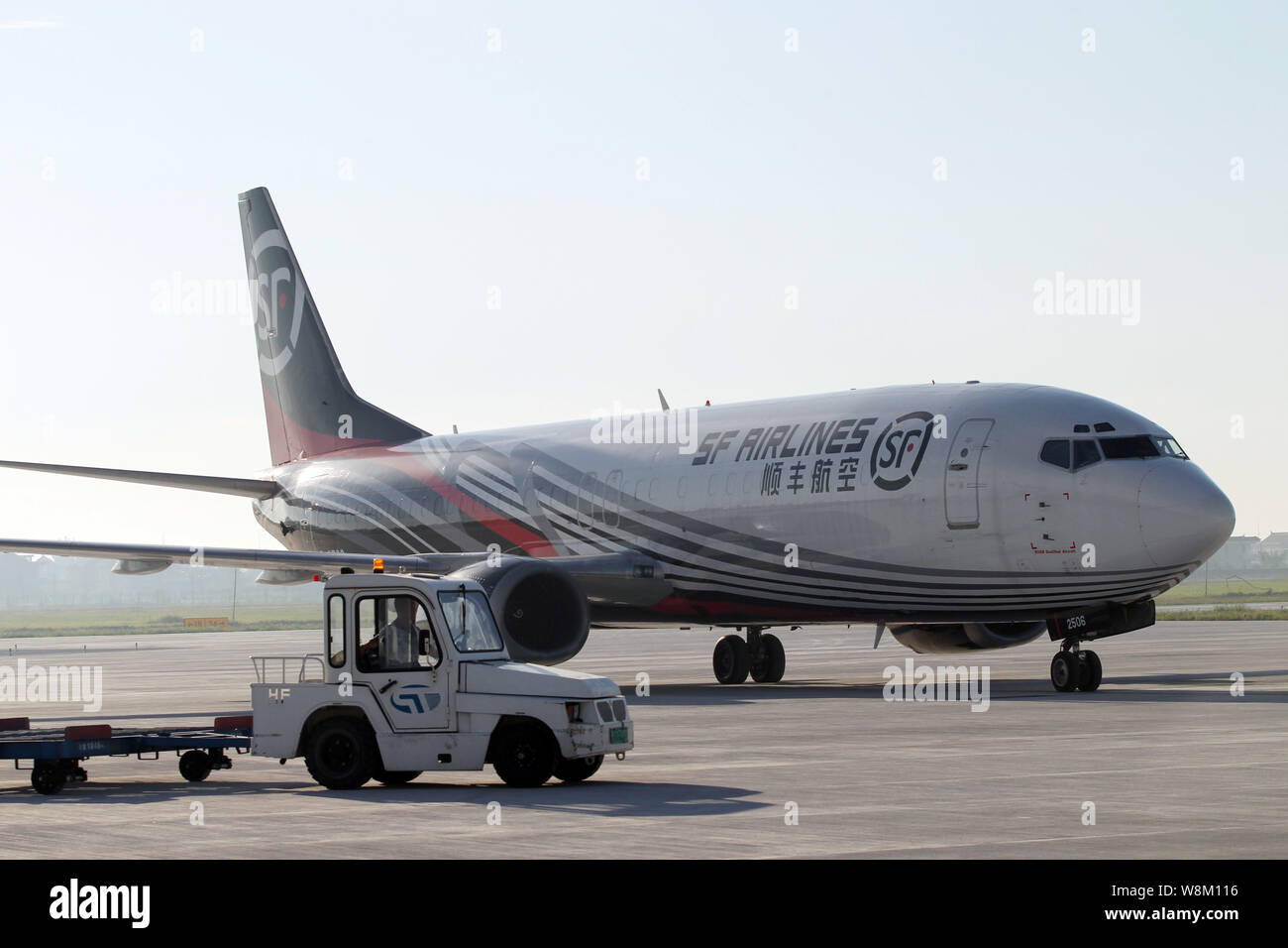 --FILE--A Boeing 737-400 cargo jet of SF Airlines taxis at the Nantong Xingdong Airport in Nantong city, east China's Jiangsu province, 4 September 20 Stock Photo