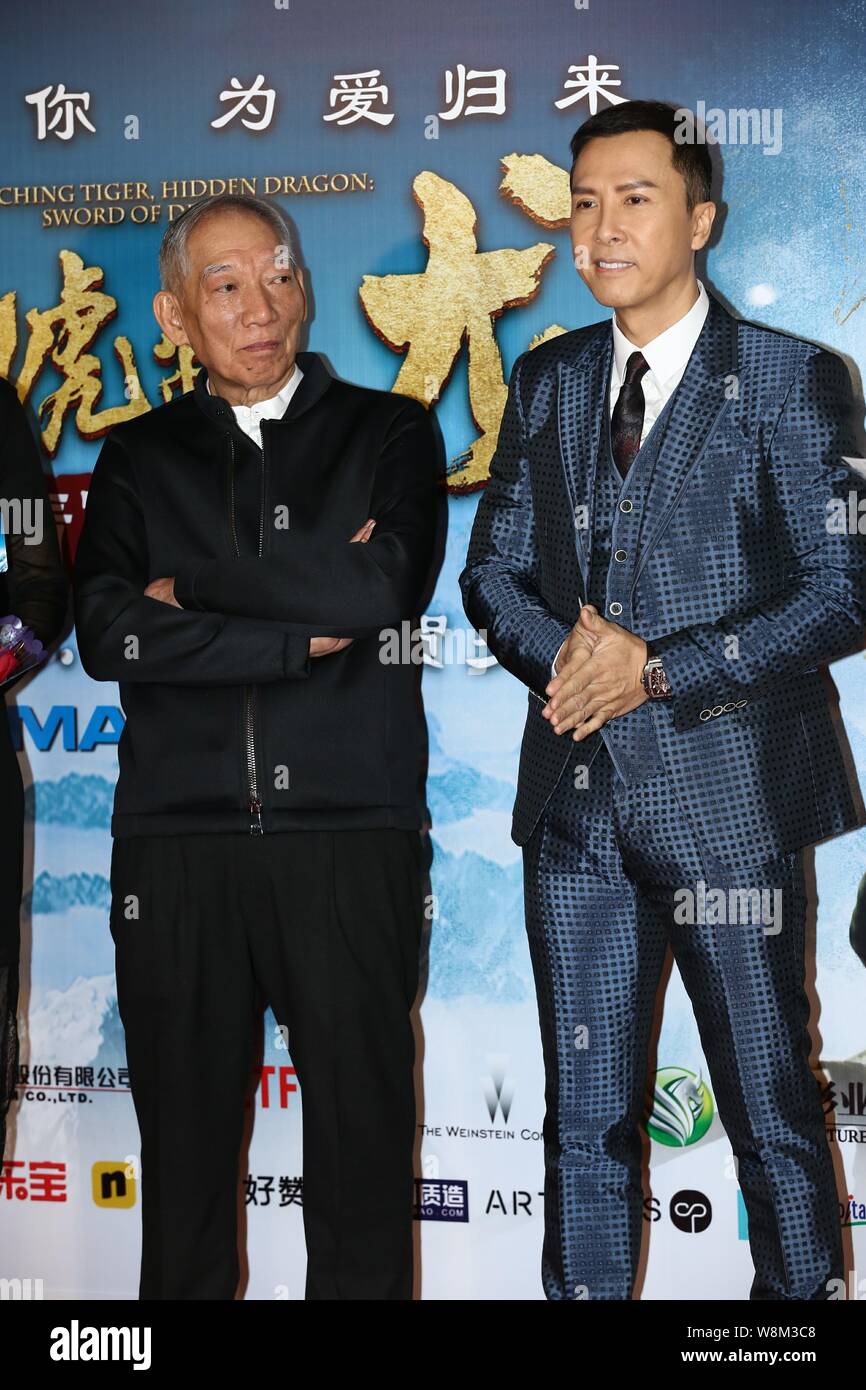 Hong Kong actor Donnie Yen, right, and director Yuen Woo-ping arrive on the red carpet for the premiere of the movie 'Crouching Tiger, Hidden Dragon: Stock Photo