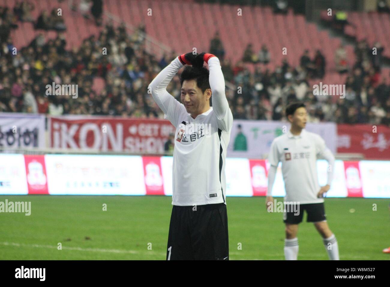 South Korean comedian and actor Jee Seokjin reacts during the "2016