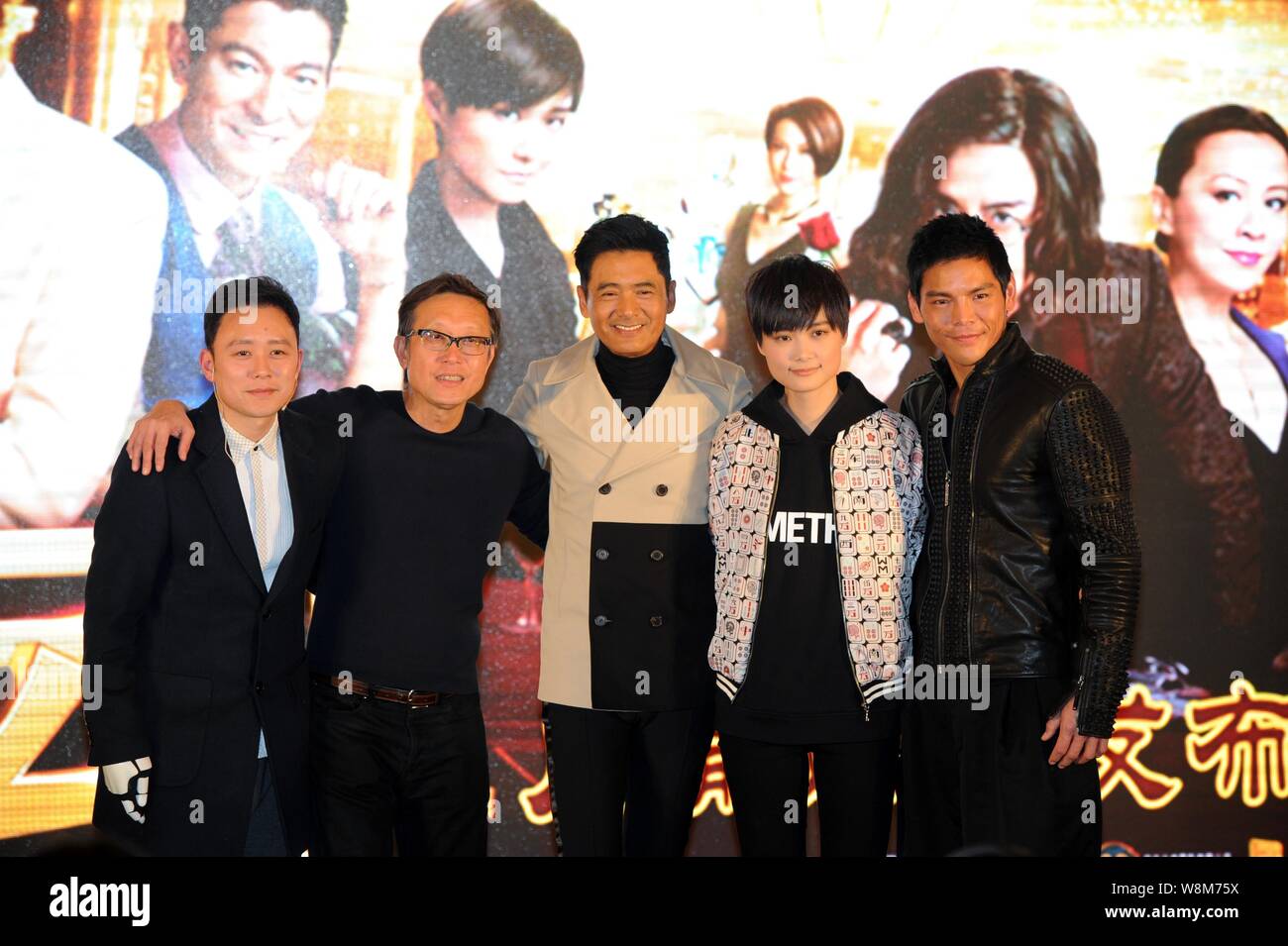 From Left Chinese Dubbing Actor Chen Hao Hong Kong Director And Producer Andrew Lau Wai Keung Actor Chow Yun Fat Chinese Singer And Actress Li Yu Stock Photo Alamy
