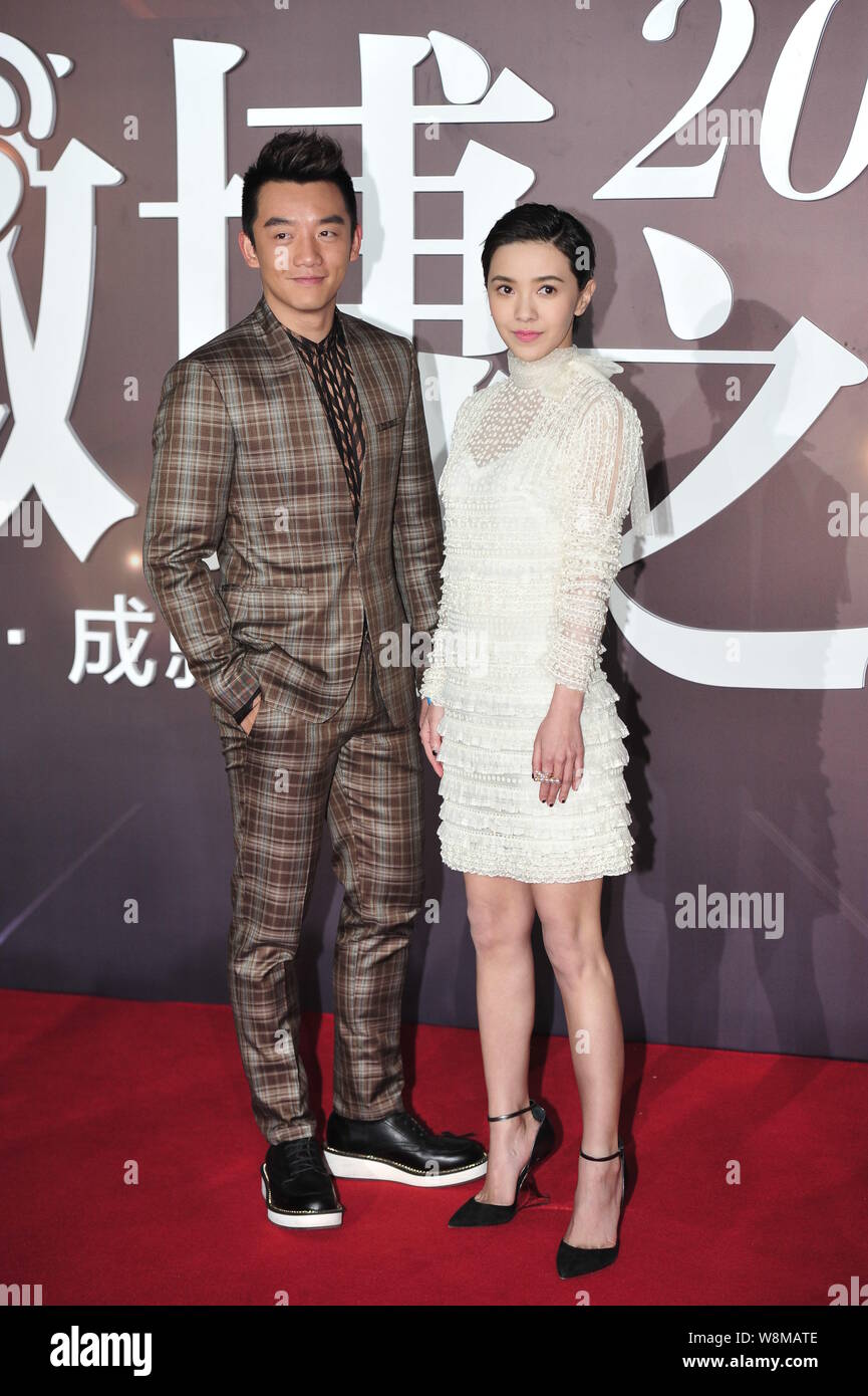 Taiwanese actress Amber Kuo, right, and Chinese actor Zheng Kai arrive ...