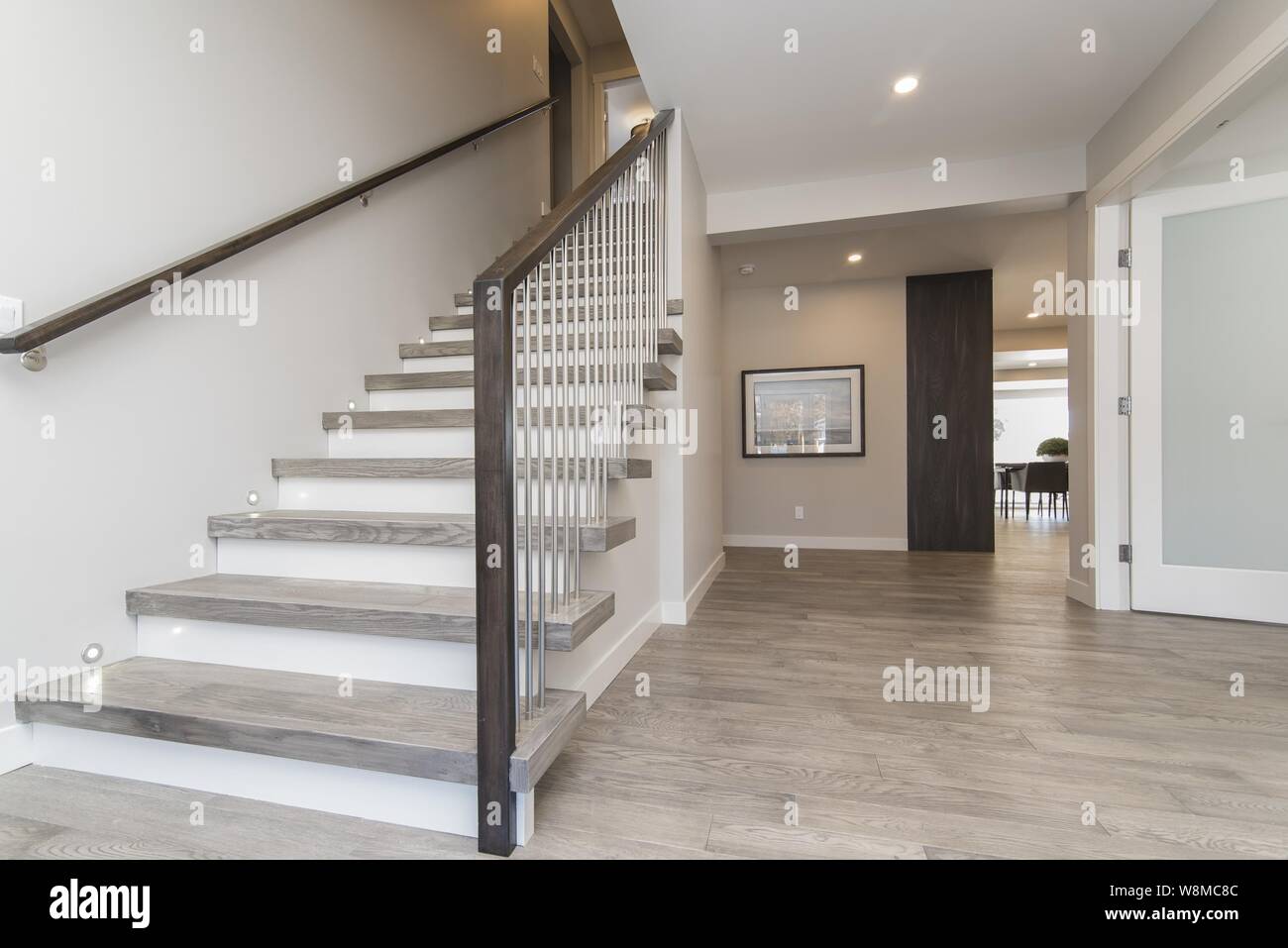 A Beautiful Shot Of A Modern House Staircase And The Hall