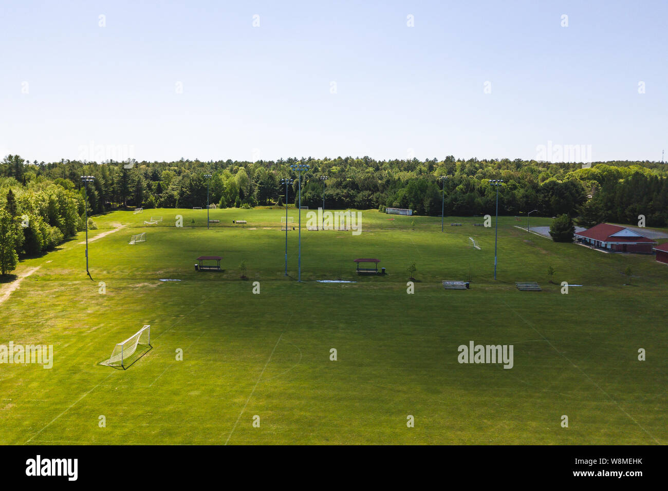 Aerial/Drone view of soccer/football field complex during the afternoon