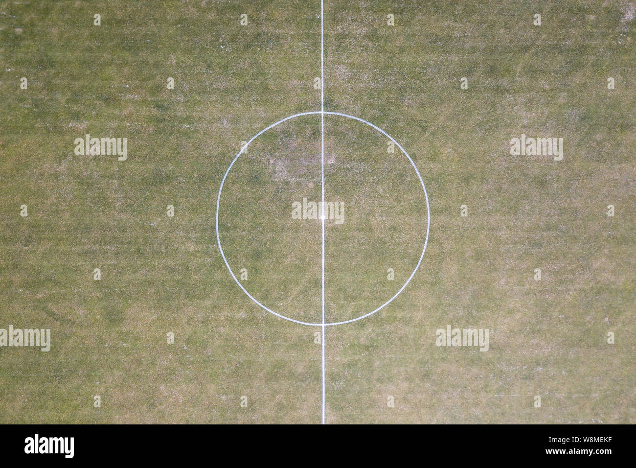 Aerial/drone view of a soccer/football field center circle at sports