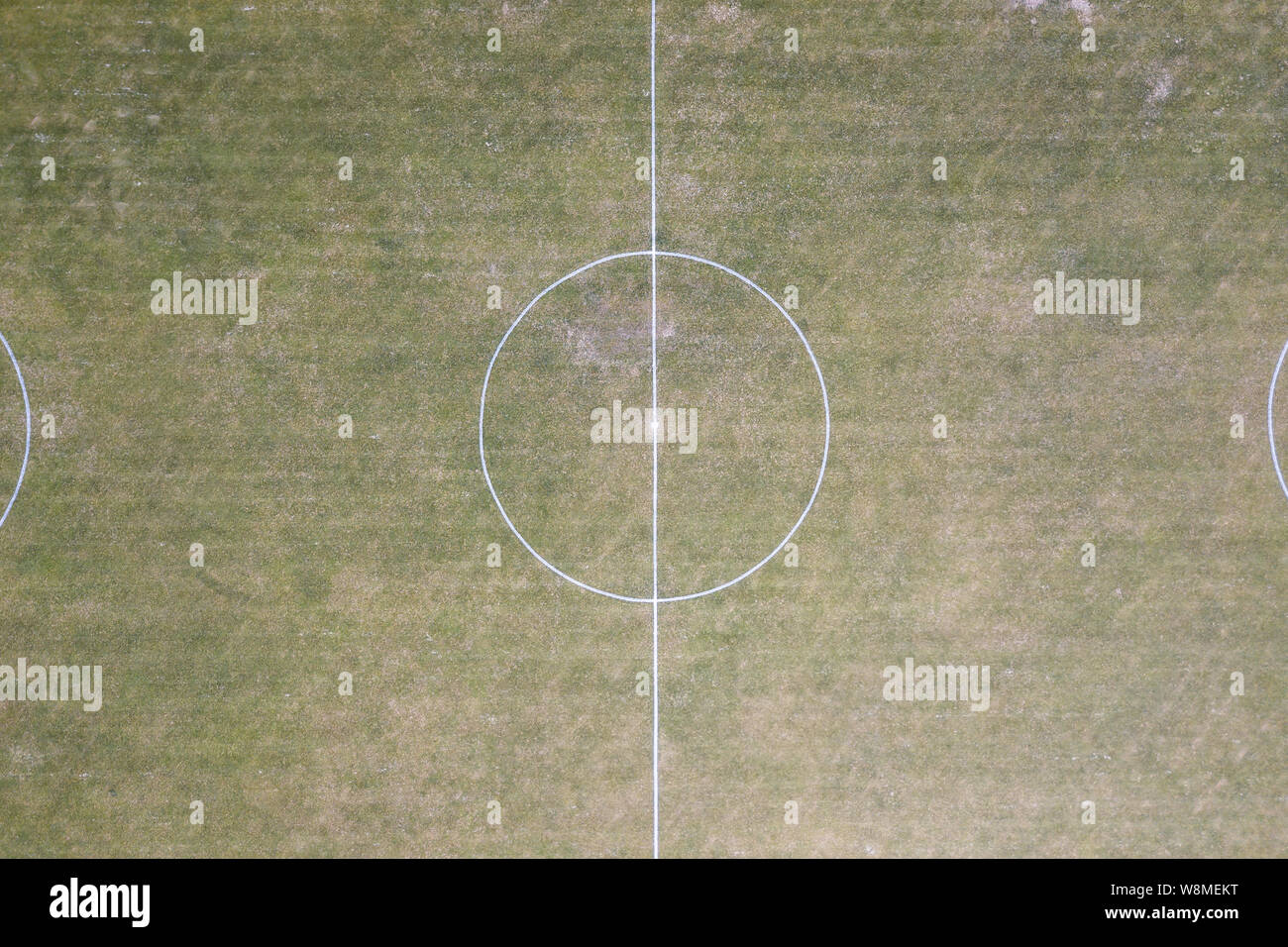 Aerial/drone view of a soccer/football field center circle at sports