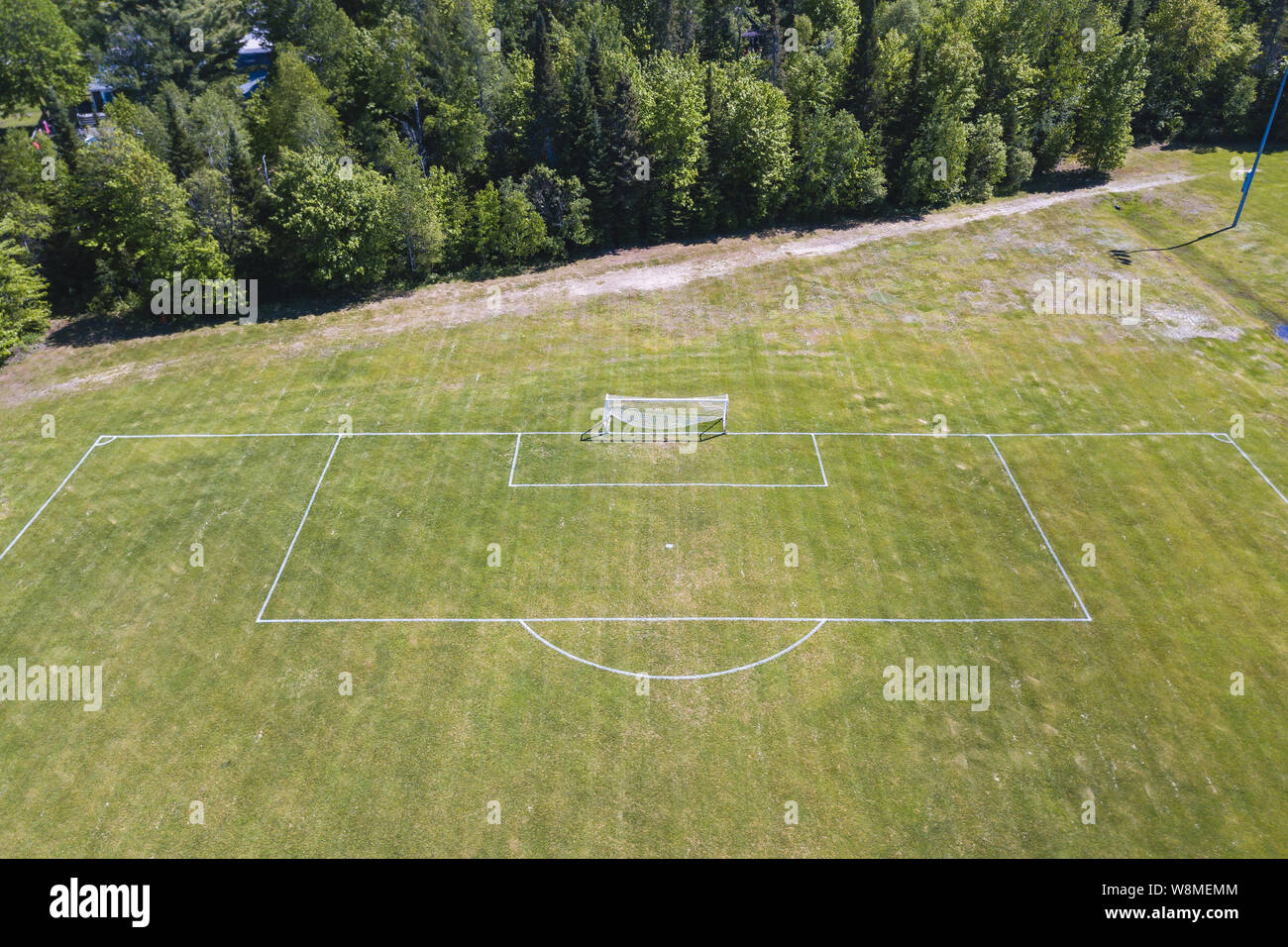 Aerial/drone view of soccer/football field net at a sports field