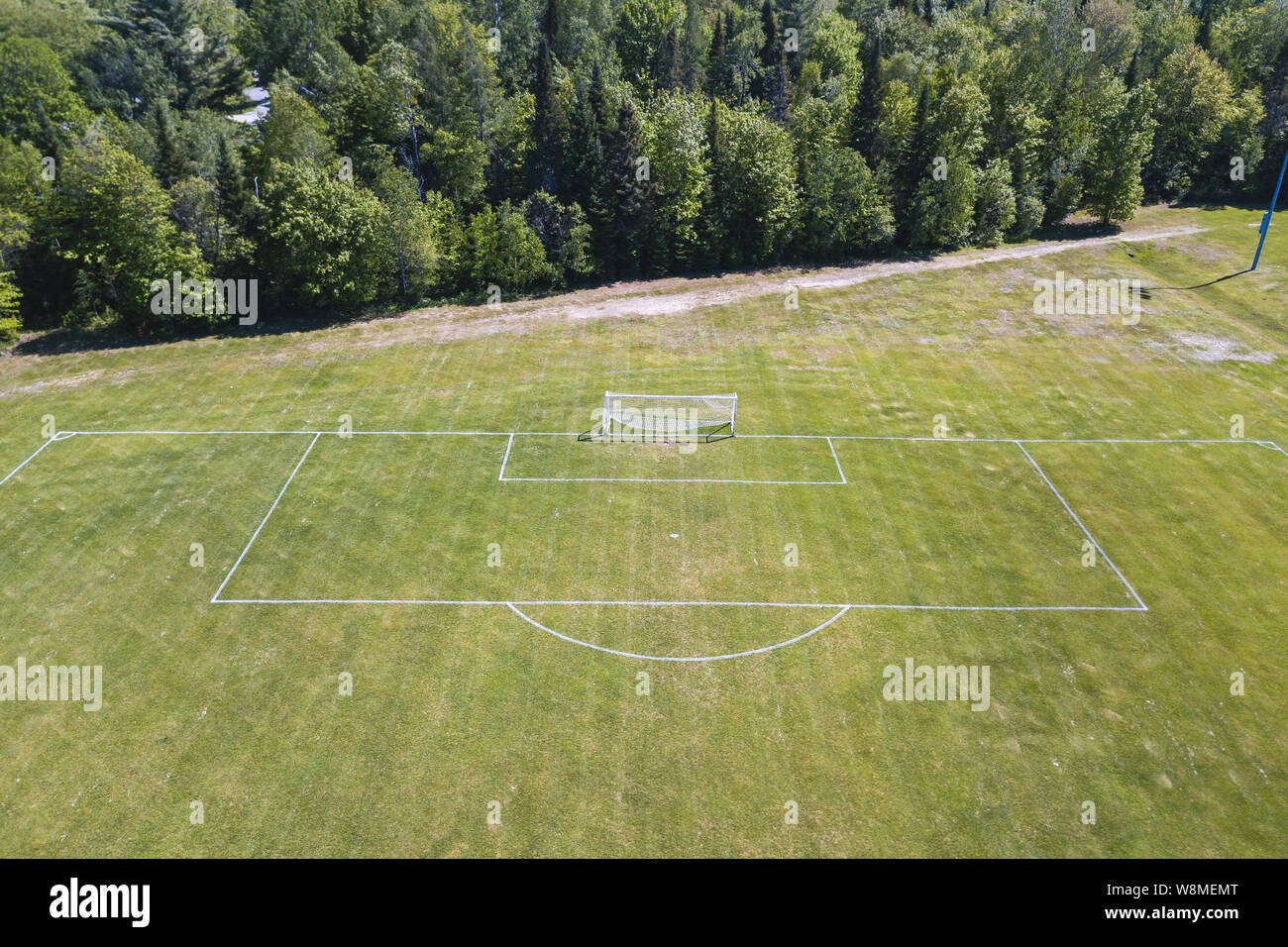 Aerial/drone view of soccer/football field net at a sports field