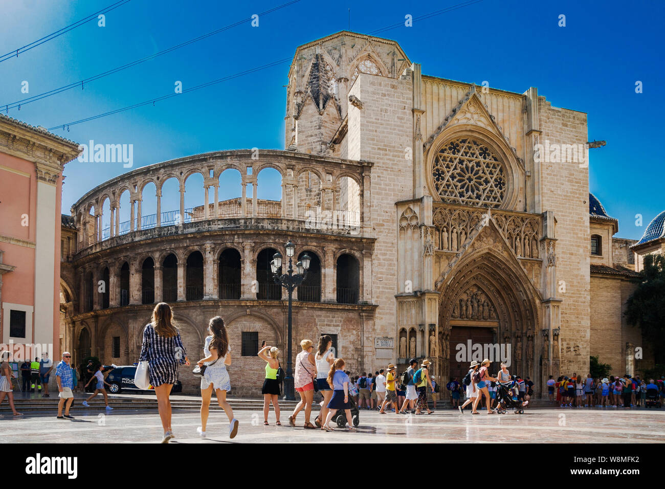 Valencia, Spain - 07/21/2019:Basílica de la Virgen de los Desamparados and Valencia Cathedral. ( La Seu de Valencia on La Plaza De La Virgen - St. Ma Stock Photo