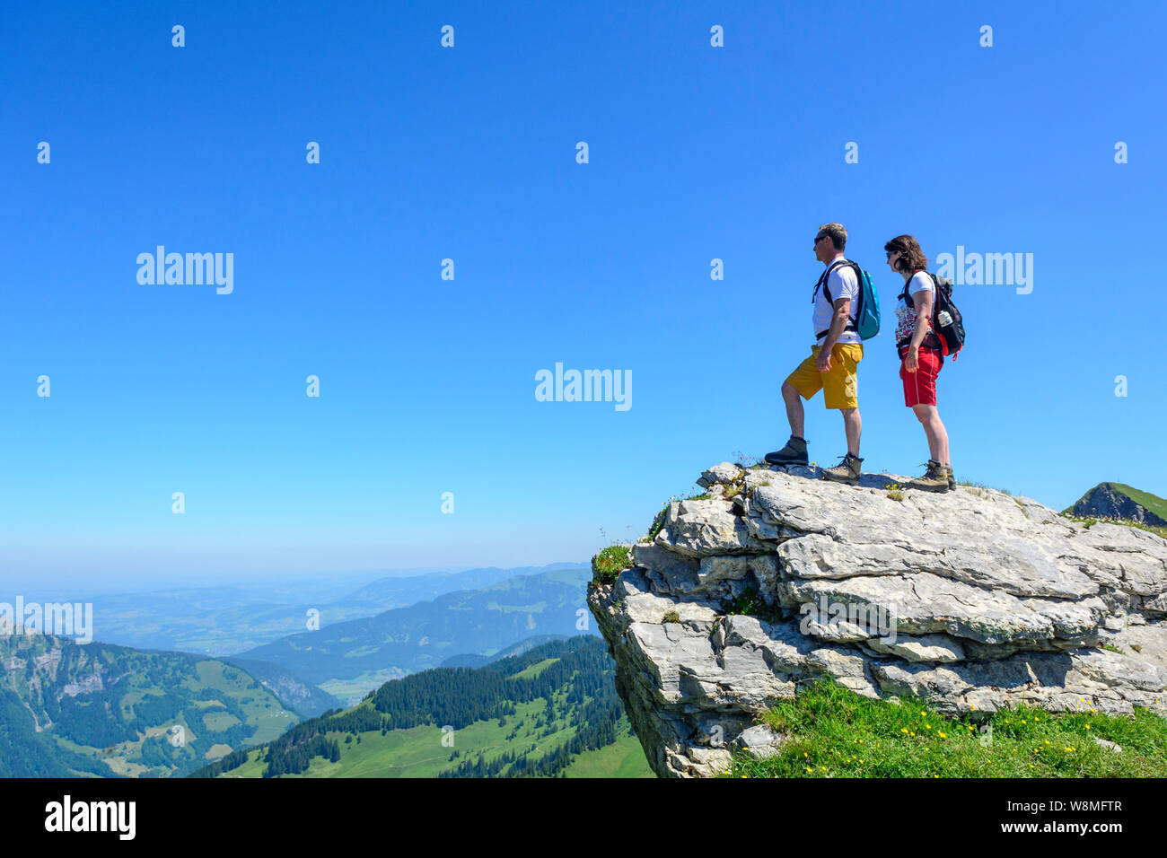 Two hikers mountains enjoying view hi-res stock photography and images ...