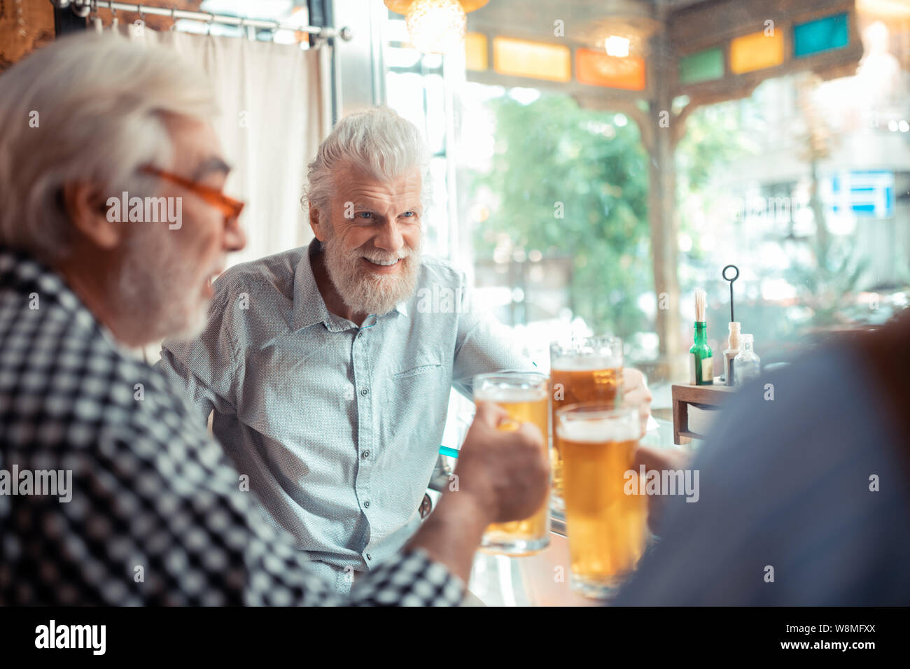 Old man drinking beer hi-res stock photography and images - Alamy