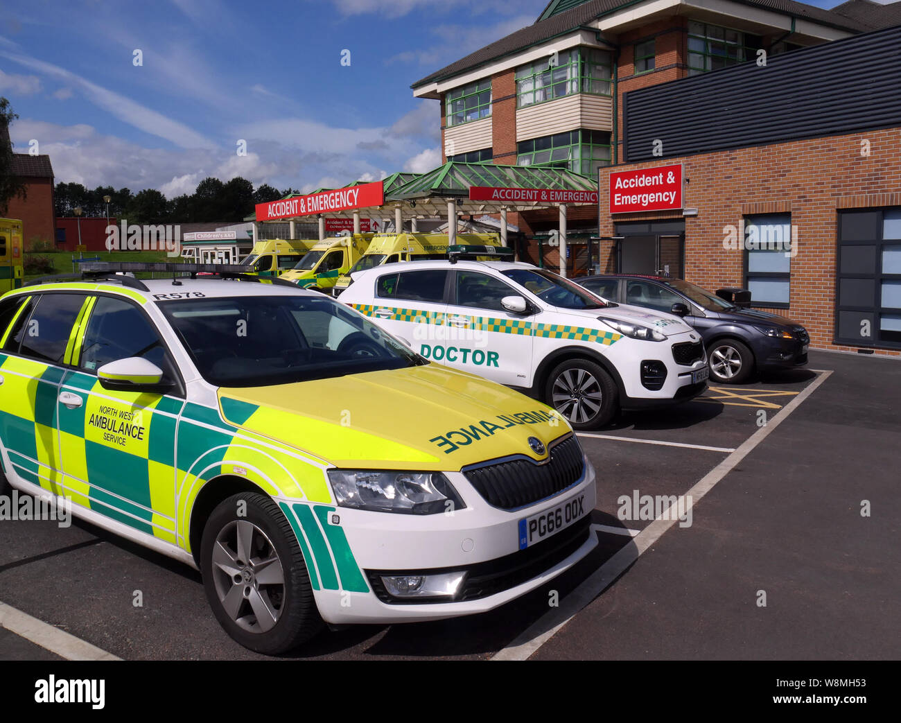 A&E Dept at The Royal Bolton Hospital, with North West Ambulance Service vehicles & doctors car, Bolton, Lancashire, England UK. photo DON TONGE Stock Photo