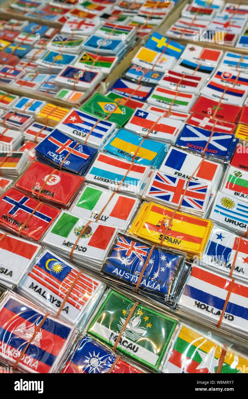 Bangkok, Thailand - March 2, 2019: Bunch of patches with world country flags. Embroidered flags background Stock Photo