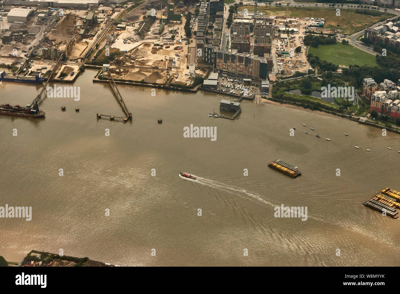 Plane window view of Docklands, London, UK Stock Photo