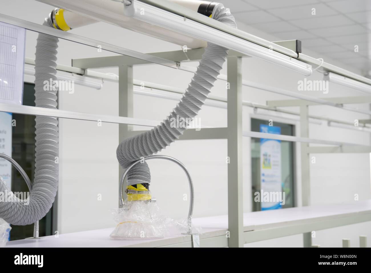 exhaust hood for smoke and heat in assembly lines Stock Photo
