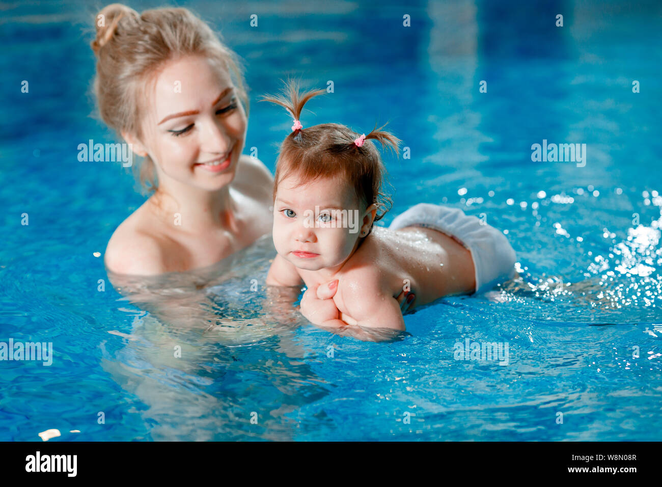 mother and baby swimming