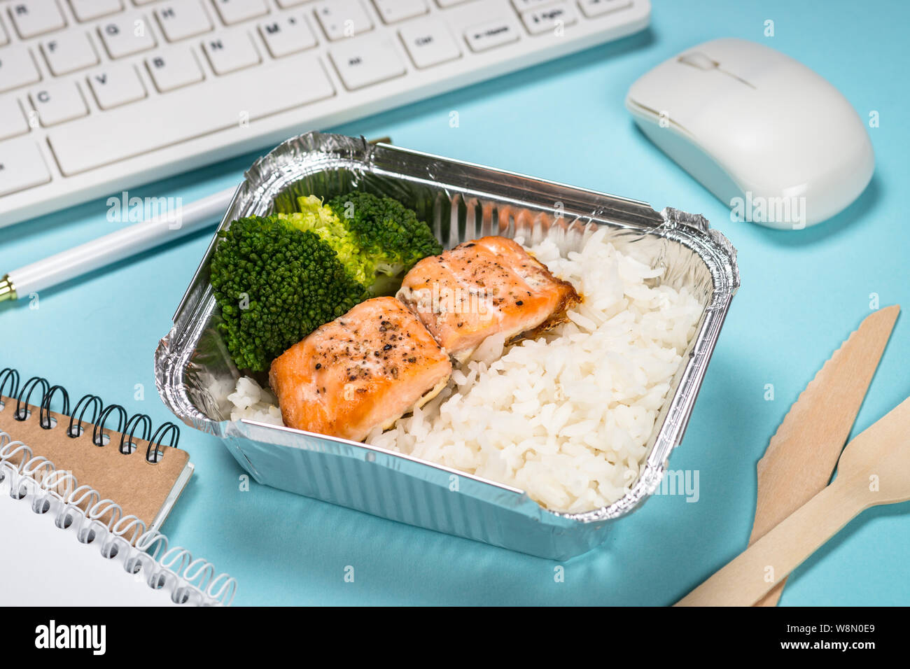 Food delivery concept - healthy lunch on office table Stock Photo - Alamy