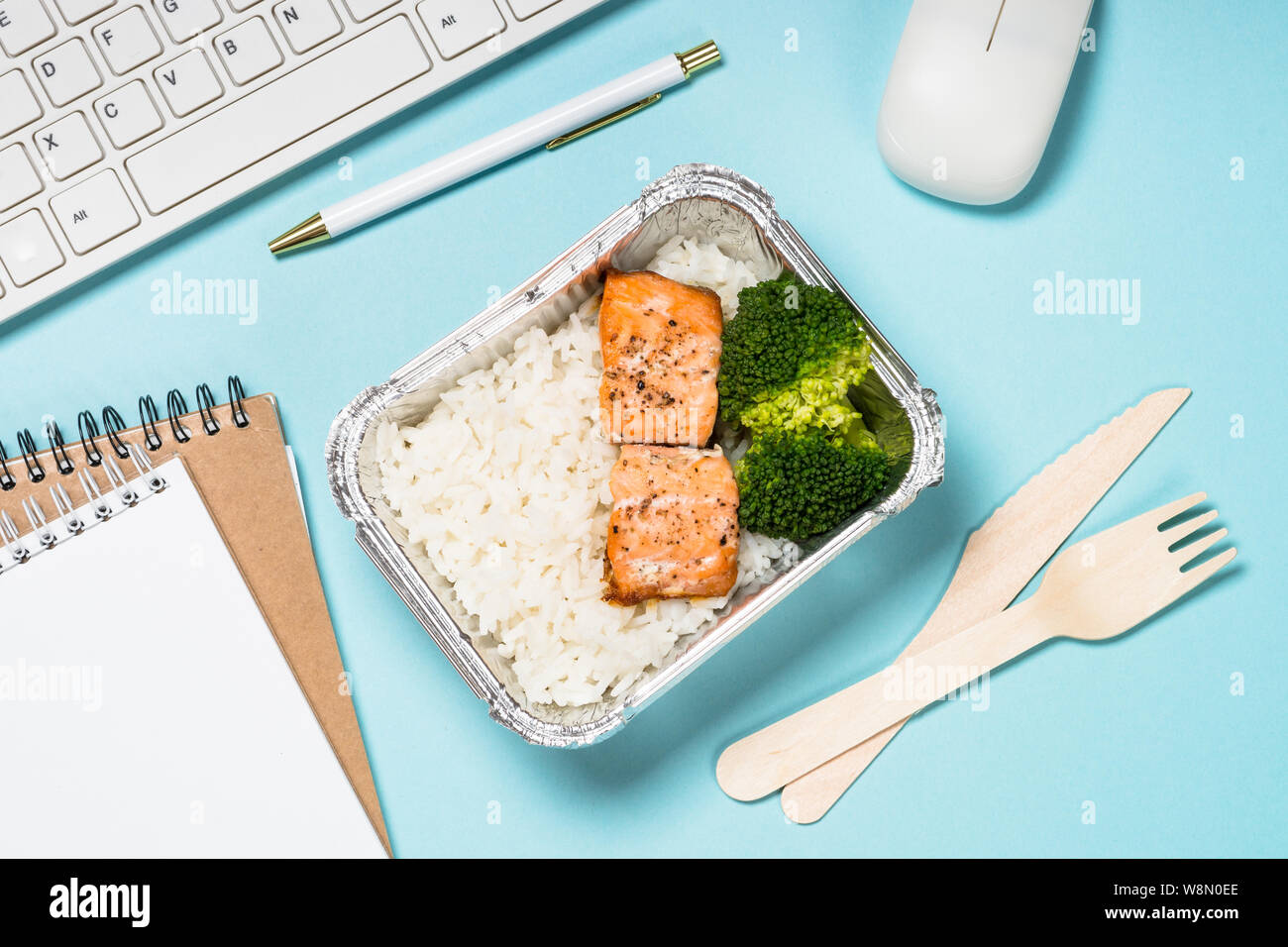 Food delivery concept - healthy lunch on office table Stock Photo - Alamy