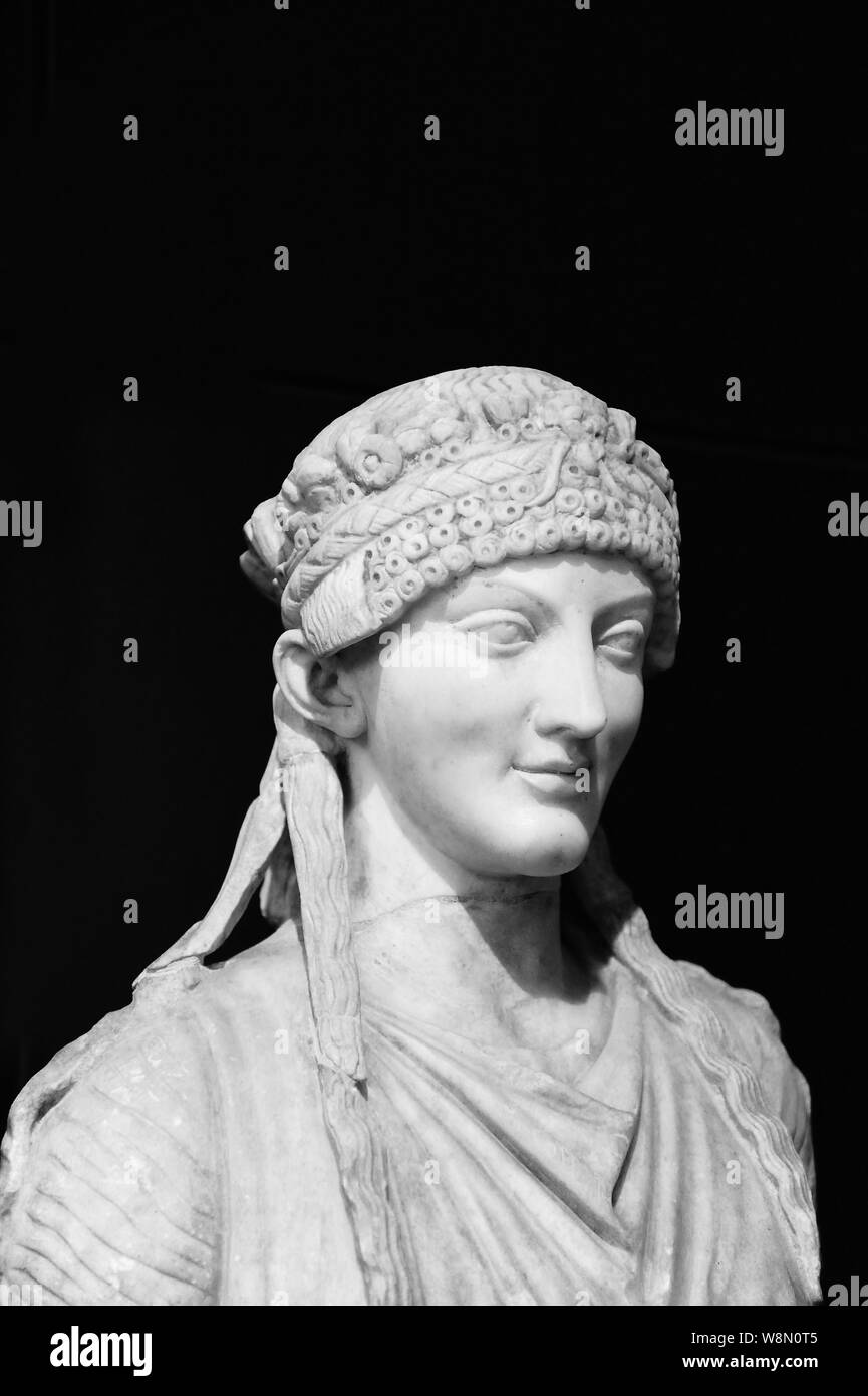 Herm of a Caryatid from the Gardens of Maecenas on black background. Rome Italy Stock Photo