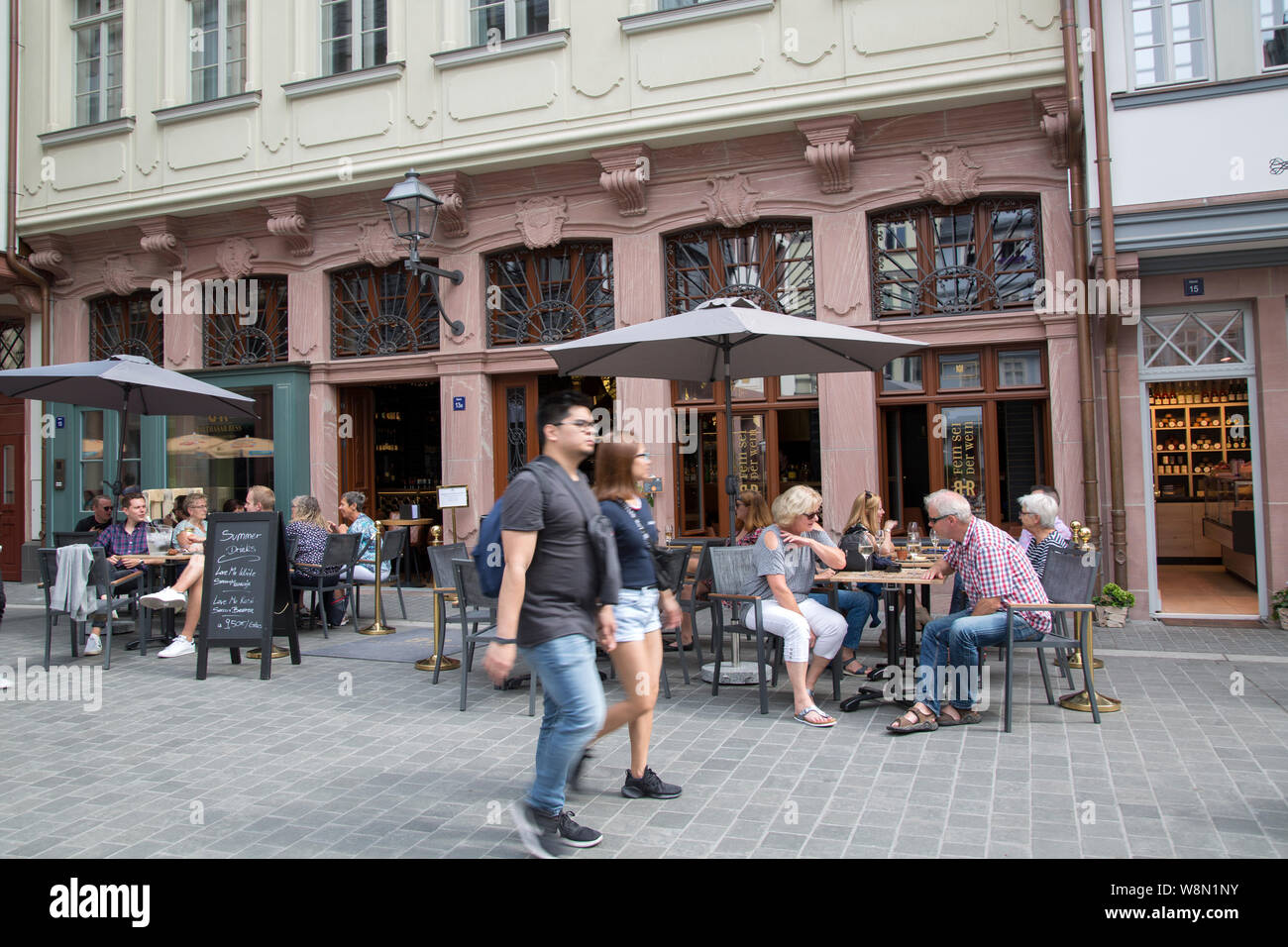 Couple outside Balthasar Ress Wine Bar, Frankfurt, Germany Stock Photo