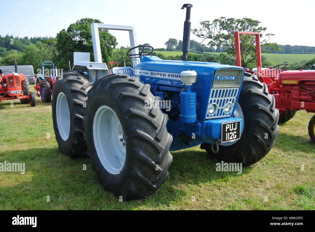 A 1969 Ford County 754 tractor parked up on display at the Torbay Steam