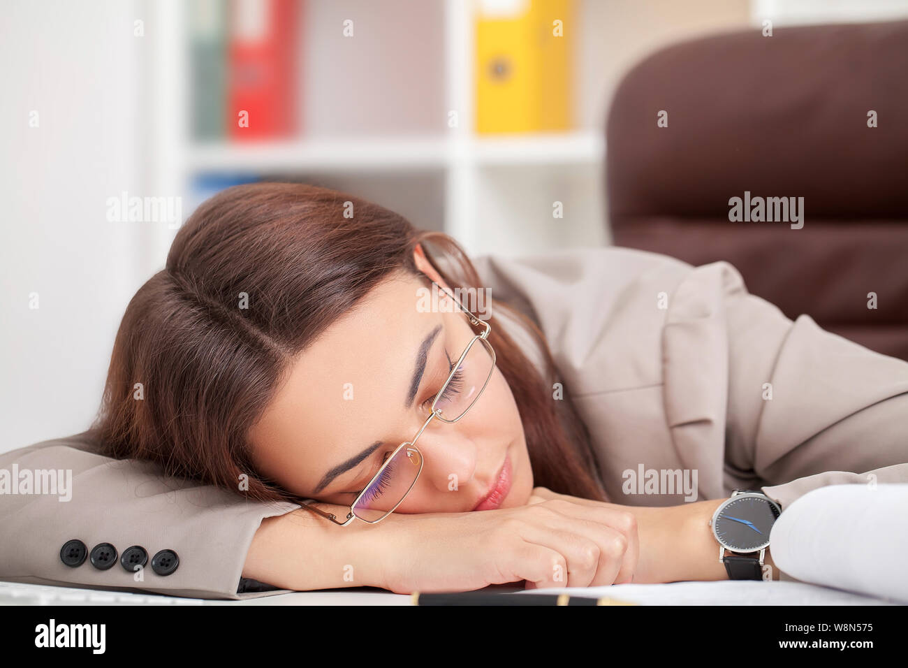 Young Tired Woman At Office Desk Sleeping With Eyes Closed Sleep