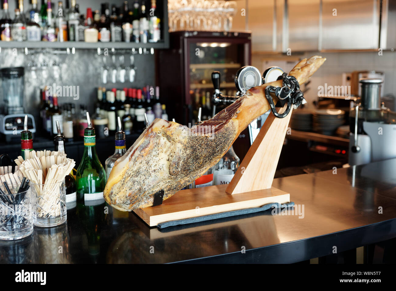Cured ham on bar counter in Spanish tapas restaurant Stock Photo Alamy
