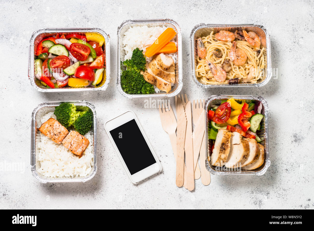 Food delivery concept - healthy lunch in boxes Stock Photo - Alamy