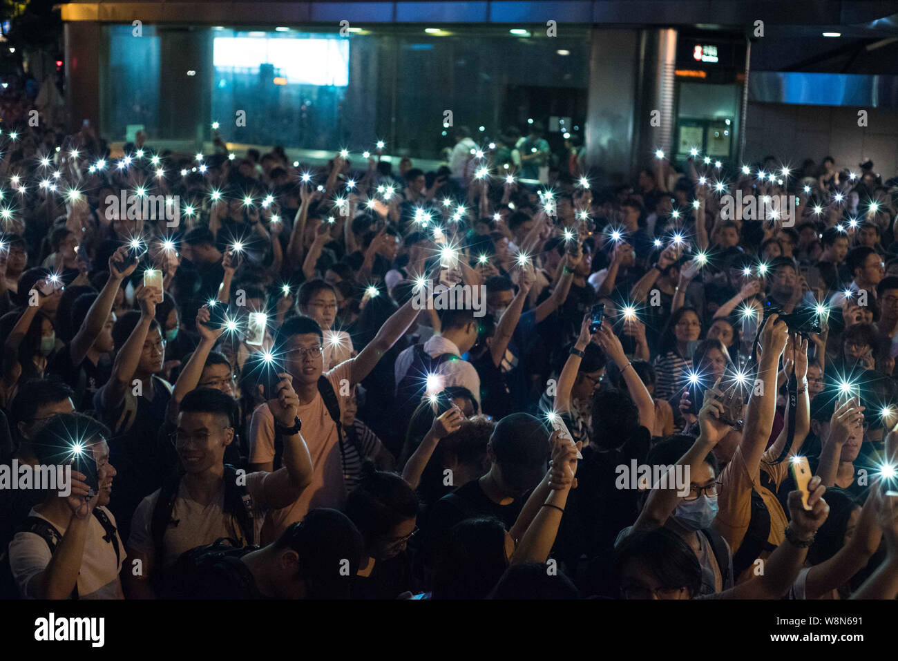 August 2, 2019, Hong Kong, Hong Kong: Participants at the civil workers rally illuminate the night with their phone lights during the protest..Protesters are out in the streets fighting for their ''5 Demands'' of the Hong Kong government, with the main demand being the full withdrawal of the controversial extradition bill. Other demands include an independent investigation into police operations and the resignation of Carrie Lam, Hong Kong's Chief Executive. (Credit Image: © Aidan Marzo/SOPA Images via ZUMA Wire) Stock Photo