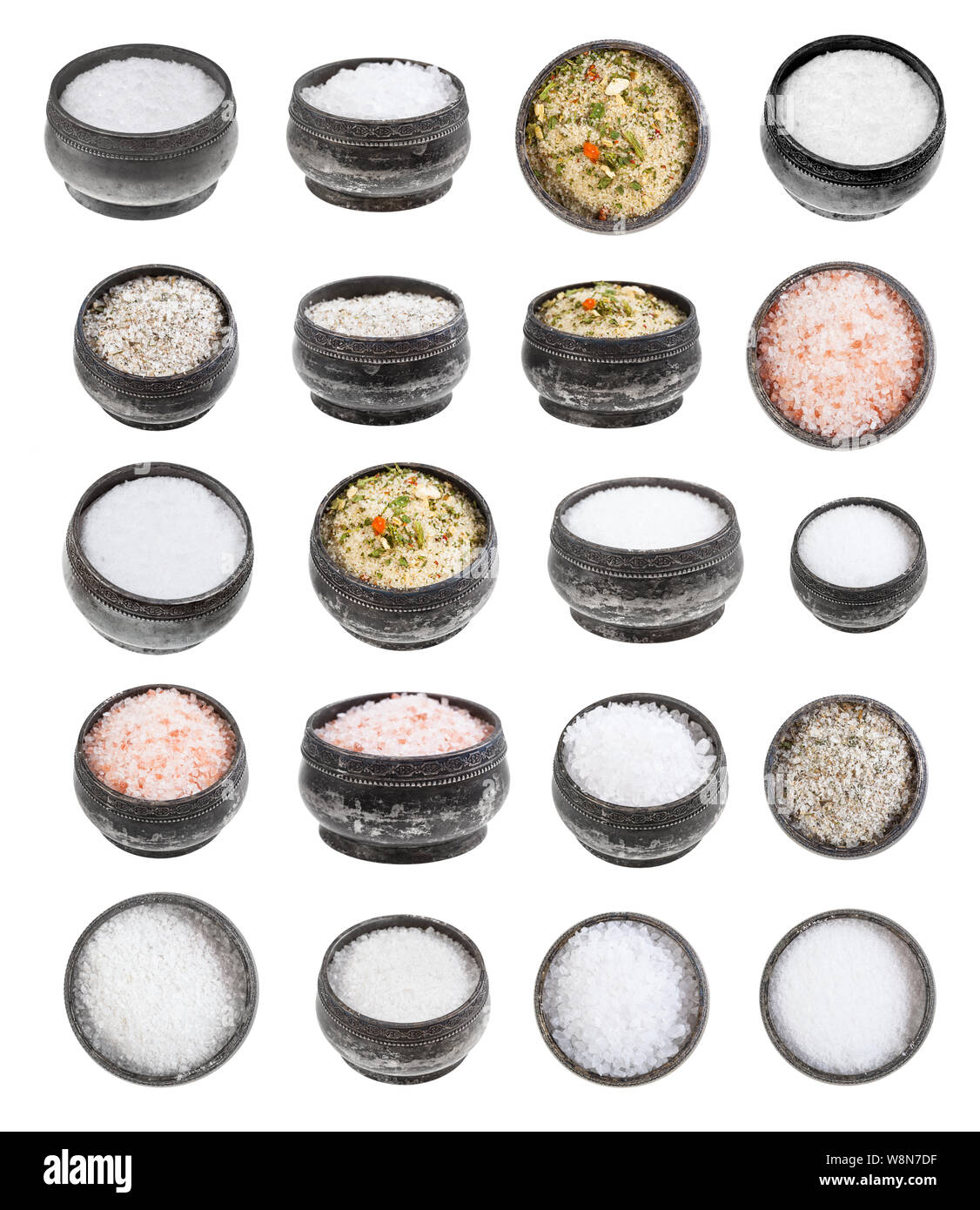 collection from old vintage silver salt cellar with various salts isolated on white background Stock Photo