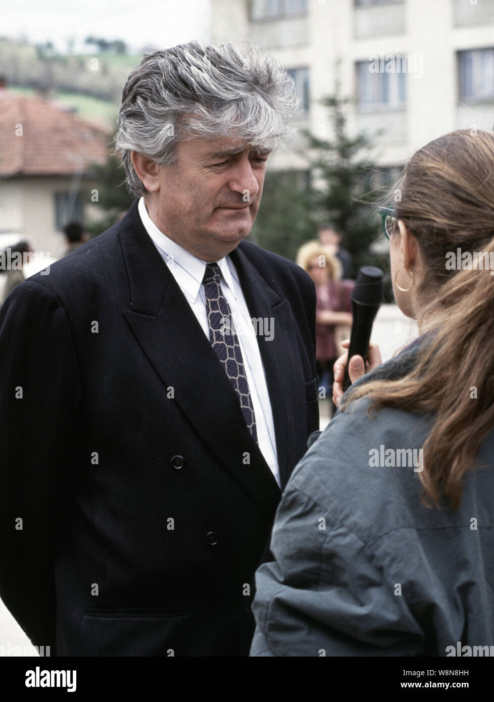 6th May 1993 During the war in central Bosnia: Italian television interviews the Bosnian Serb leader, Dr. Radovan Karadžić, outside the SRT building (Republika Srpska Television) in Pale. The National Assembly of Republika Srpska had been meeting to decide whether or not to accept the Vance-Owen Peace Plan. Stock Photo