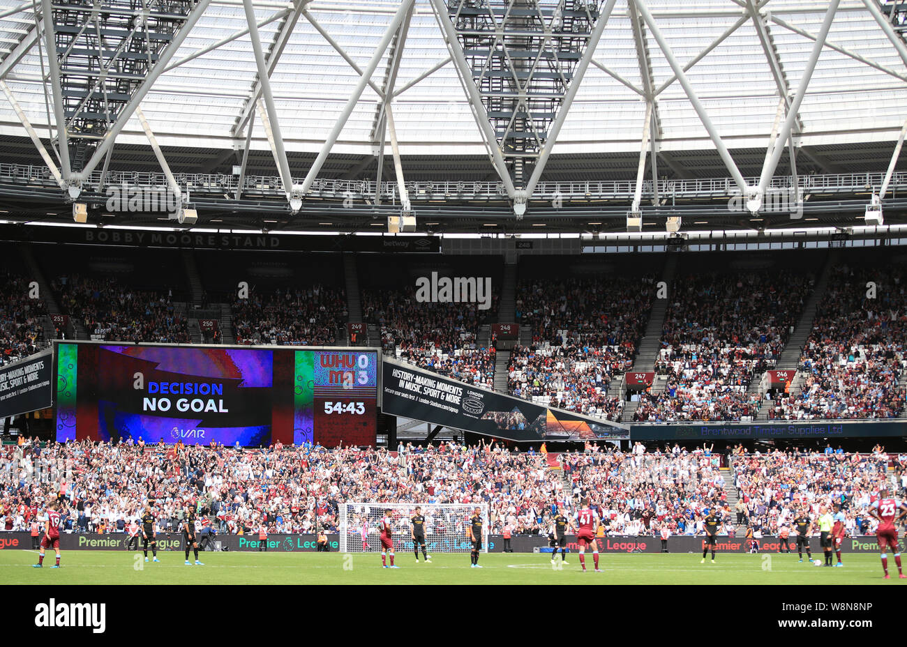 VAR check decides Manchester City's Raheem Sterling's third goal is disallowed during the Premier League match at London Stadium. Stock Photo