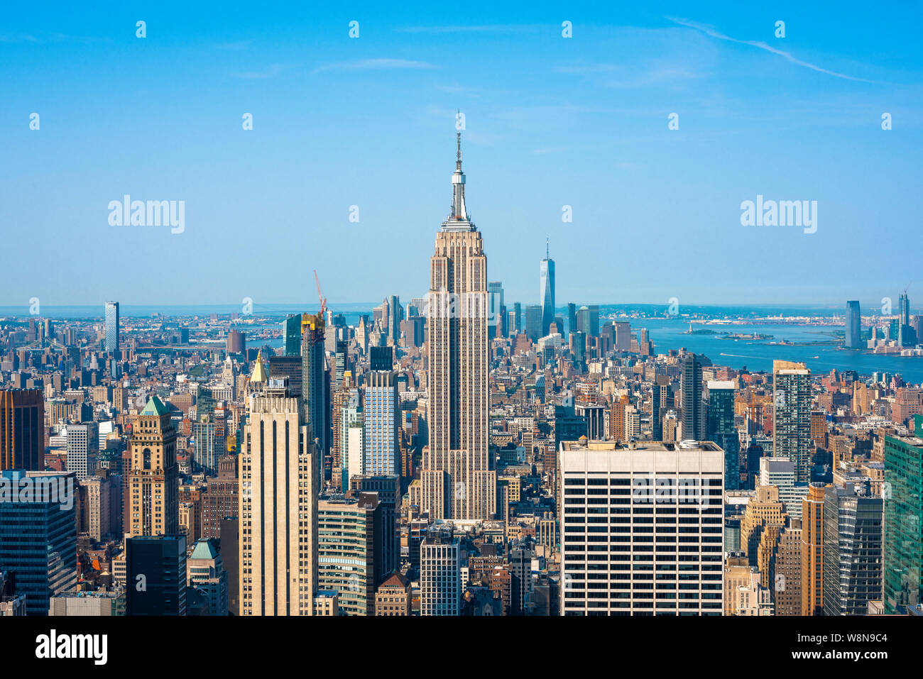 New York iconic, classic view in summer of the Midtown Manhattan skyline with the Empire State building sited at centre, New York City, USA Stock Photo