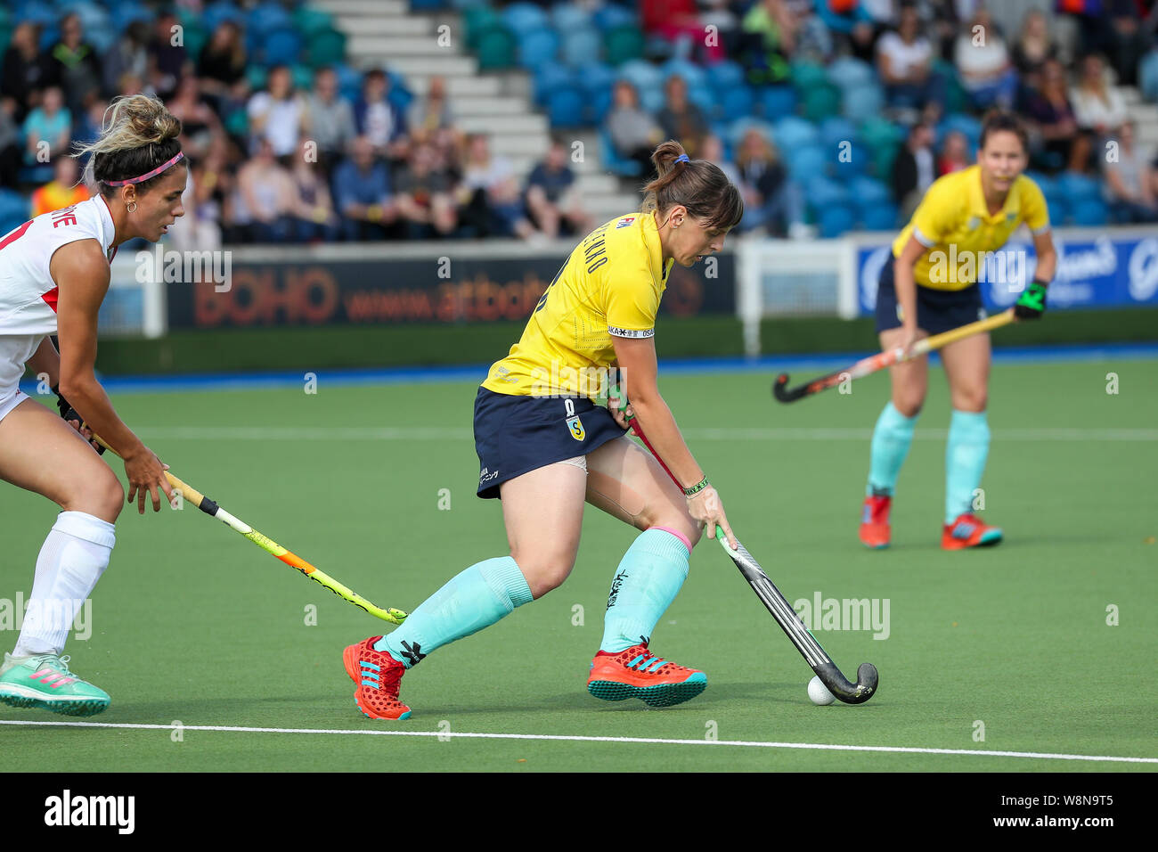 Glasgow, Scotland, UK. 10th Aug 2019. The final day of the Women's Eurohockey Championship ll held at Glasgow National Hockey Centre was a sell-out with thousands of spectators filling the stands and open areas surrounding the pitch to watch highly competitive matches between teams across Europe. Pics of Turkey (white) vs Ukraine (yellow) when Ukraine won 5 - 2 Credit: Findlay/Alamy Live News Stock Photo