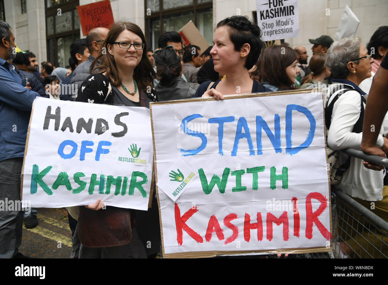 London, UK. 10th Aug, 2019. Hundreds Kashmiris protest India terrorists and Indian army occupation revoke article 370 and 35A. The same language Israel apartheid in Palestine outside India Embassy London, I ask one of the protestor support Kashmir, can i ask you a human word no about my race of where i come from do you agree the cruel world is created by white people, and she nervously reply and say yes the white people it to blame. on 20 August 2019, UK. Credit: Picture Capital/Alamy Live News Stock Photo