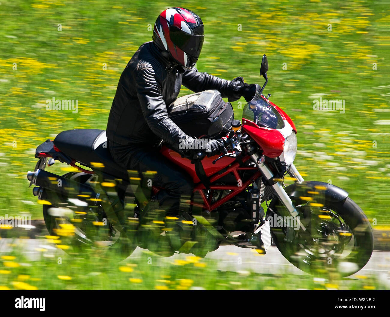 Motorcycling in summer in wonderful places in nature. Stock Photo