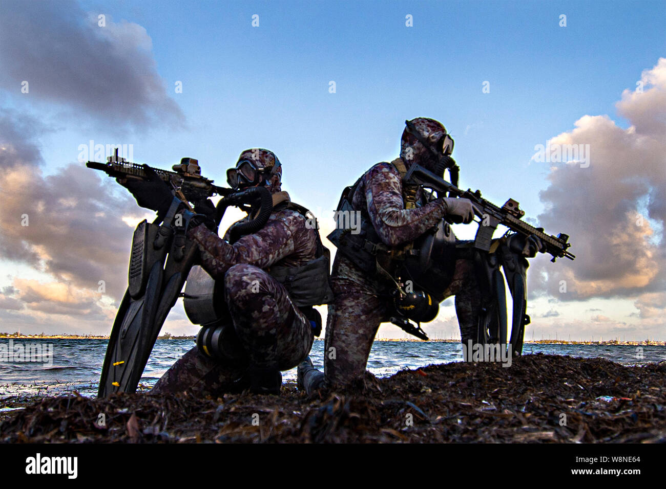 US Navy SEALs assigned to Naval Special Warfare Group 2 are pictured conducting military dive operations off the East Coast of the United States on May 29 2019. SEALs, the maritime component of US Special Forces, are trained to conduct missions from sea, air and land and engage in a continuous training cycle to improve and further specialize skills needed during deployments across the globe. Stock Photo