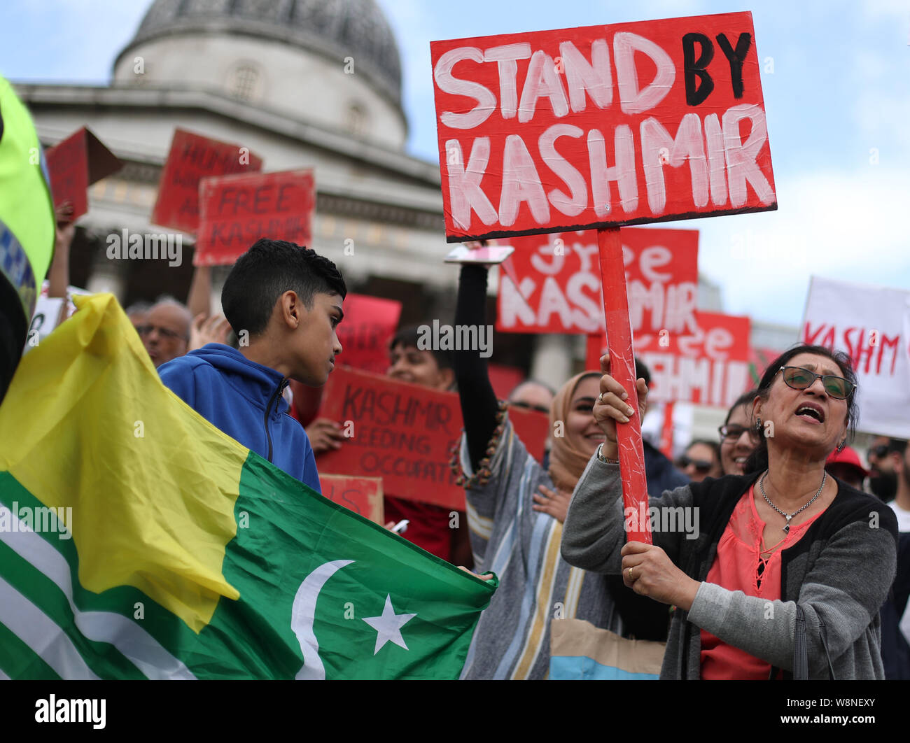 Demonstrators during a Freedom For Kashmir protest against the Indian government - after it stripped Kashmir of its Indian-administered special status - in Trafalgar Square, London. Stock Photo
