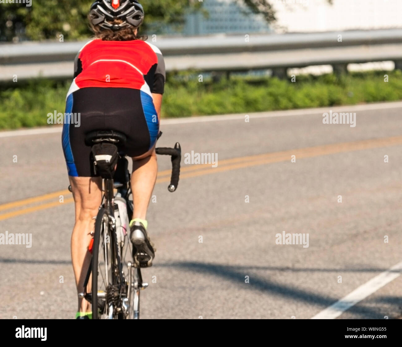 Female cyclist hires stock photography and images Alamy