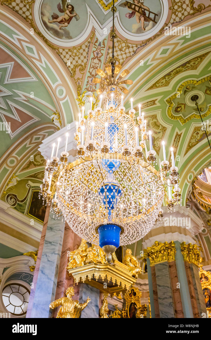 The ornate interior and chandeliers inside the Peter and Paul cathedral in the Peter and Paul Fortress, St Petersburg, Russia on 22 July 2019 Stock Photo