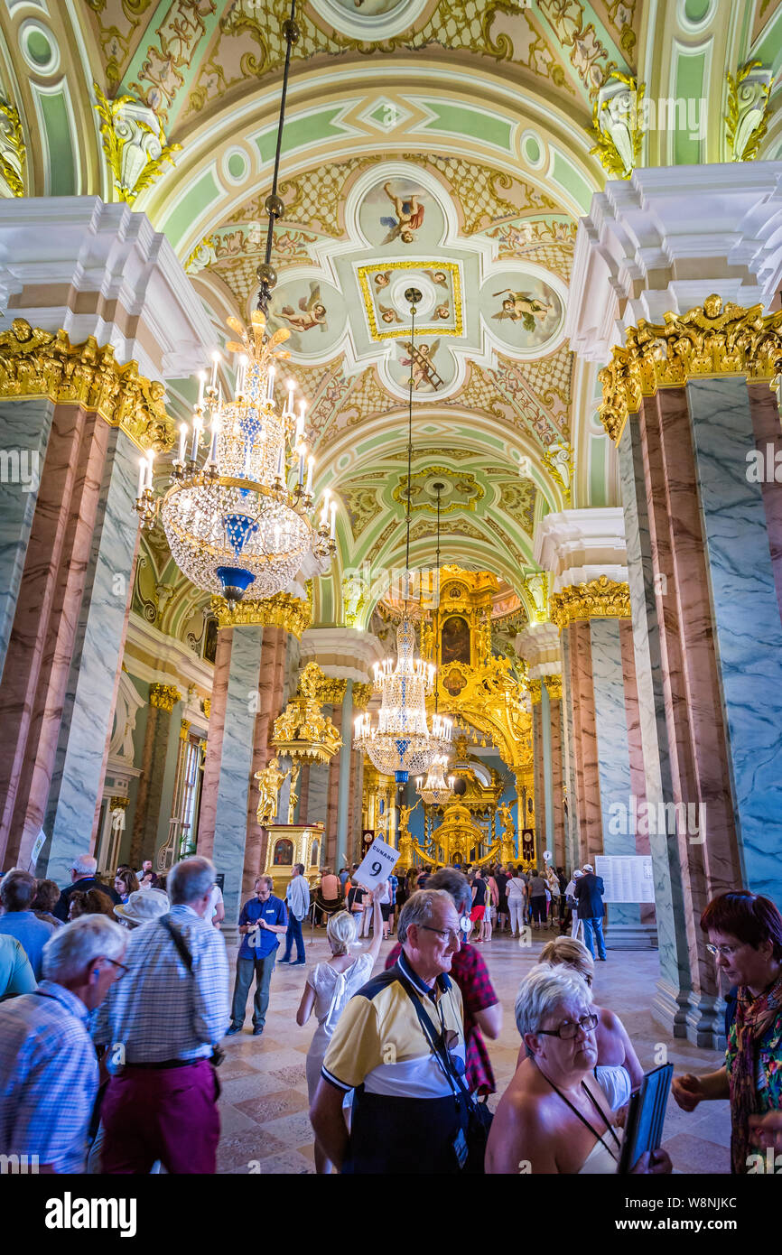 The ornate interior and chandeliers inside the Peter and Paul cathedral in the Peter and Paul Fortress, St Petersburg, Russia on 22 July 2019 Stock Photo
