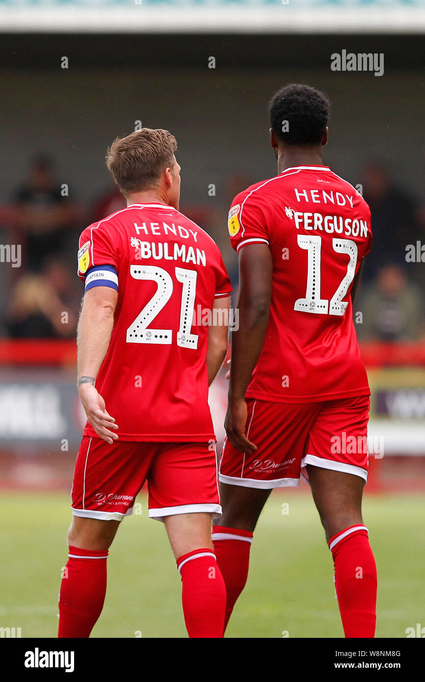 Crawley, UK. 10th Aug, 2019. Nathan Ferguson of Crawley Town and Dannie Bulman during the EFL Sky Bet League 2 match between Crawley Town and Salford City at the Checkatrade.com Stadium, Crawley, England on 10 August 2019. Photo by Carlton Myrie. Editorial use only, license required for commercial use. No use in betting, games or a single club/league/player publications. Credit: UK Sports Pics Ltd/Alamy Live News Stock Photo