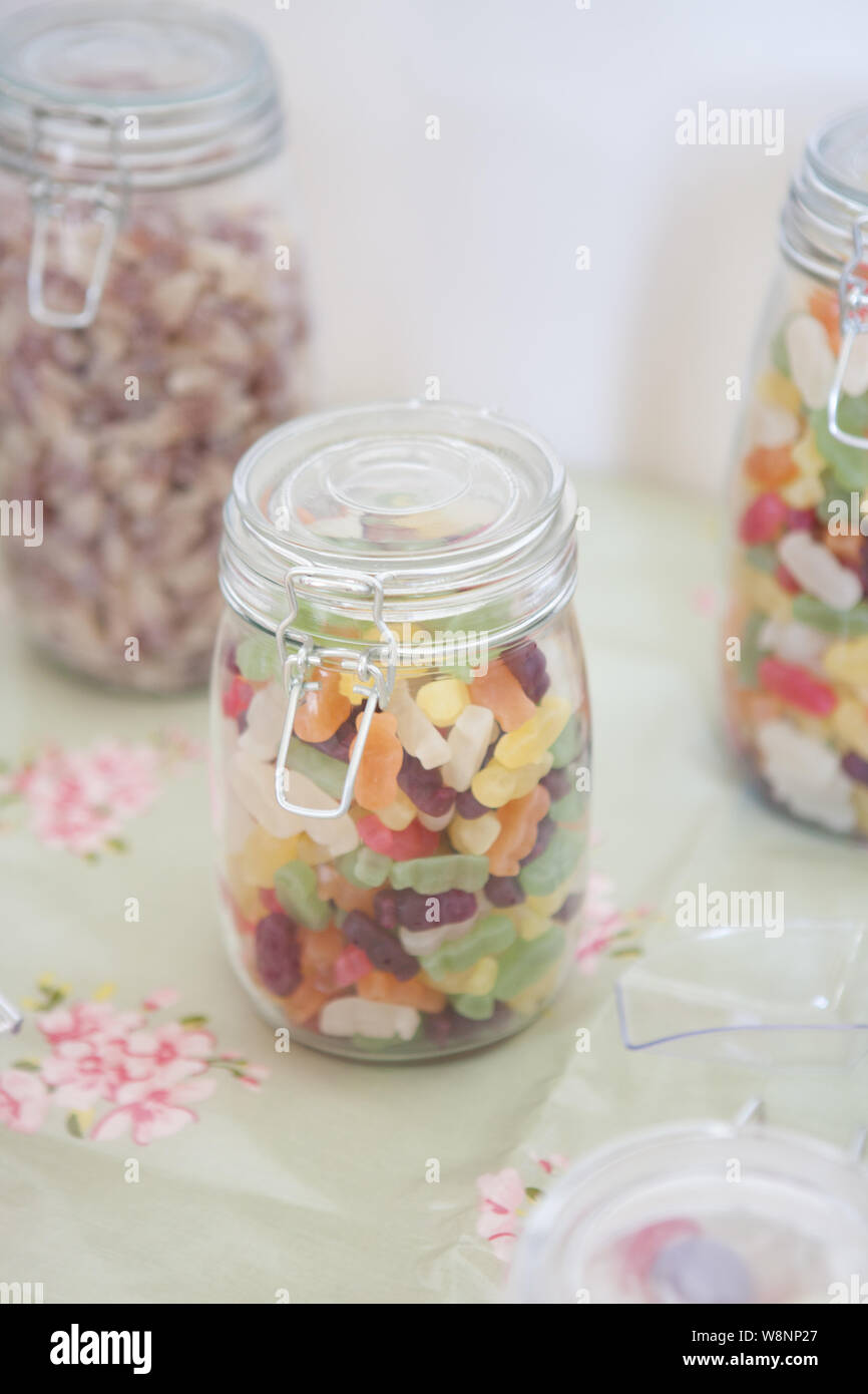 Sweet Jars filled with Jelly Babies and Fizzy Cola Bottles Stock Photo