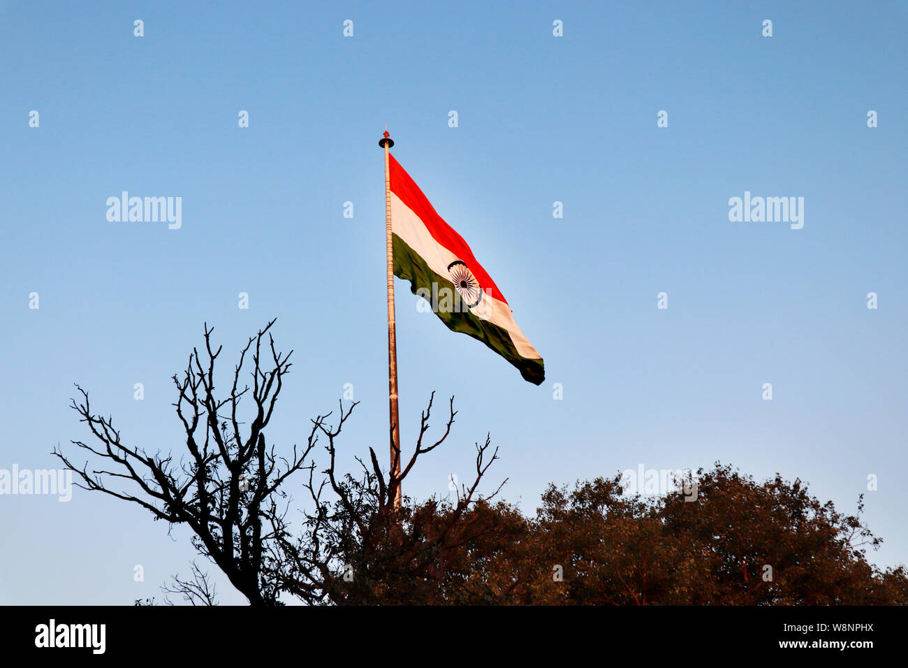 Indian National Flag waving.  The national flag of the republic of India. Picture taken from Wagha Border in Panjab, India. Stock Photo