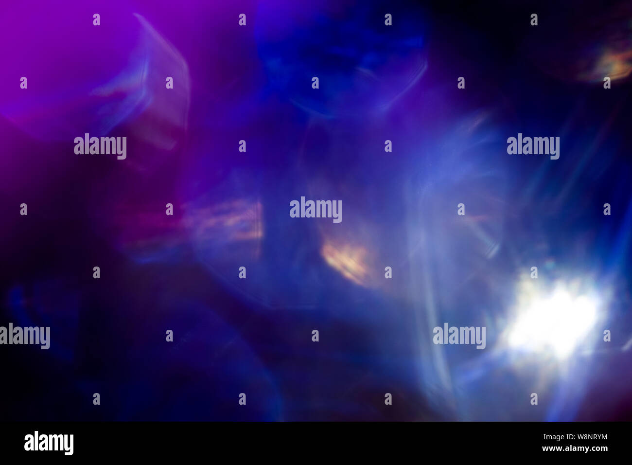 Smooth blue spots of bright light shining on dark background Stock ...